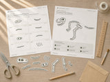 Dinosaur Dig printable fossil pieces and mystery skeleton activity in use